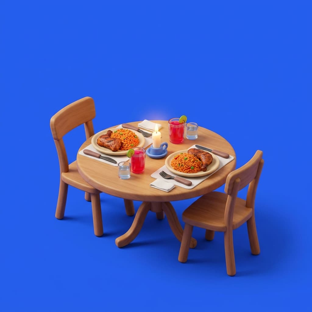 A table set for two with plates of jollof rice